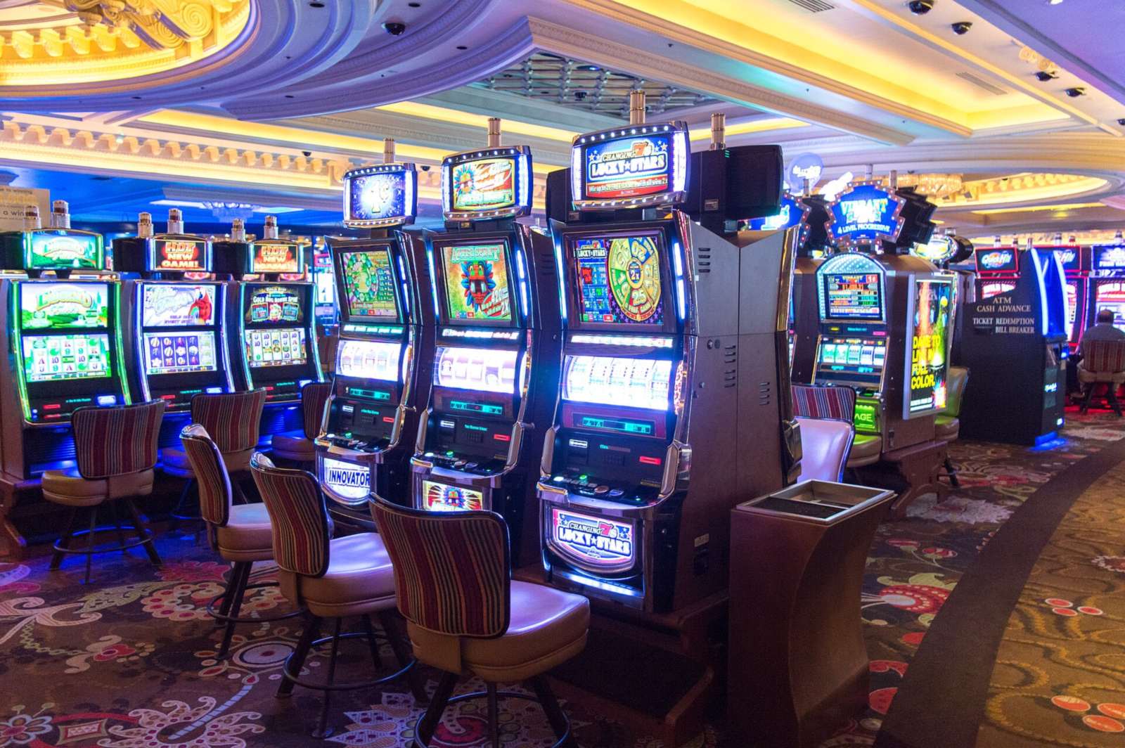 Row of slot machines on a casino floor, Monte Carlo, Las Vegas